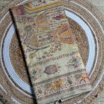 Cream Kani Silk Saree With Intricate Woven Motifs