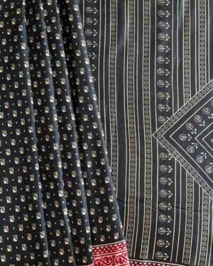 Printed Tusser Silk in Black With Red Border