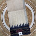 Off White Pure Tusser Saree With Ikat Border And Temple Design