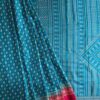 Printed Tussar Silk in Teal Blue With Red Border