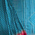 Printed Tussar Silk in Teal Blue With Red Border