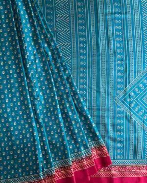 Printed Tussar Silk in Teal Blue With Red Border