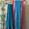 Printed Tussar Silk in Teal Blue With Red Border