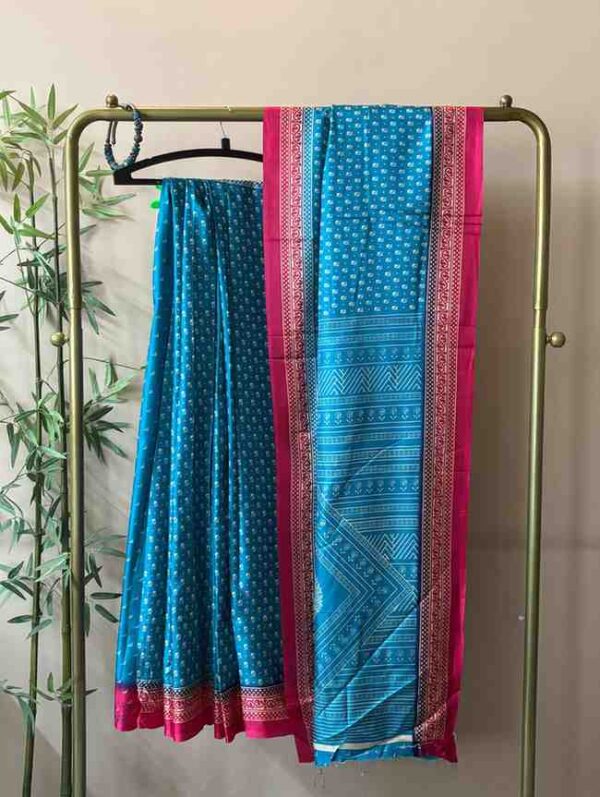 Printed Tussar Silk in Teal Blue With Red Border